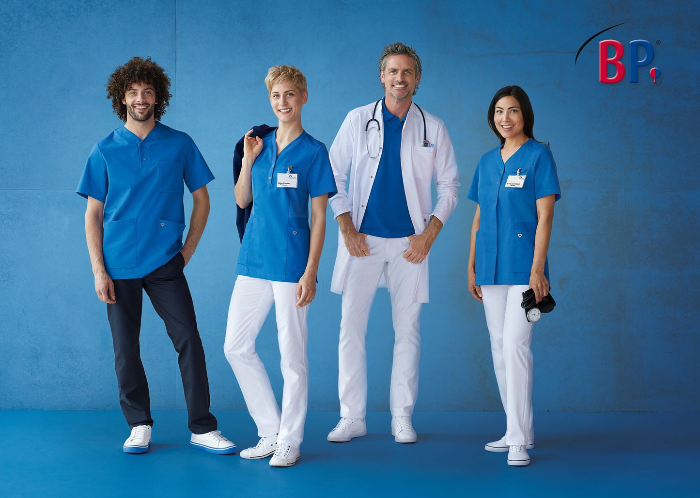 BP unisex zorgtuniek met armliftsysteem, borstzak en drukknopen voor optimale bewegingsvrijheid