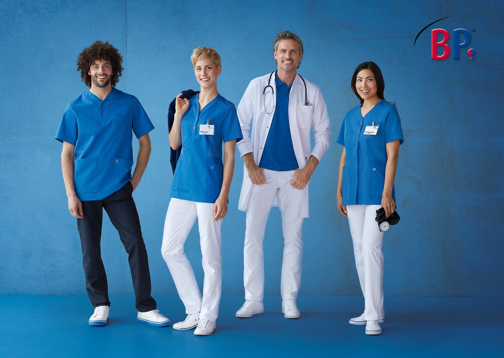 BP unisex zorgtuniek met armliftsysteem, borstzak en drukknopen voor optimale bewegingsvrijheid