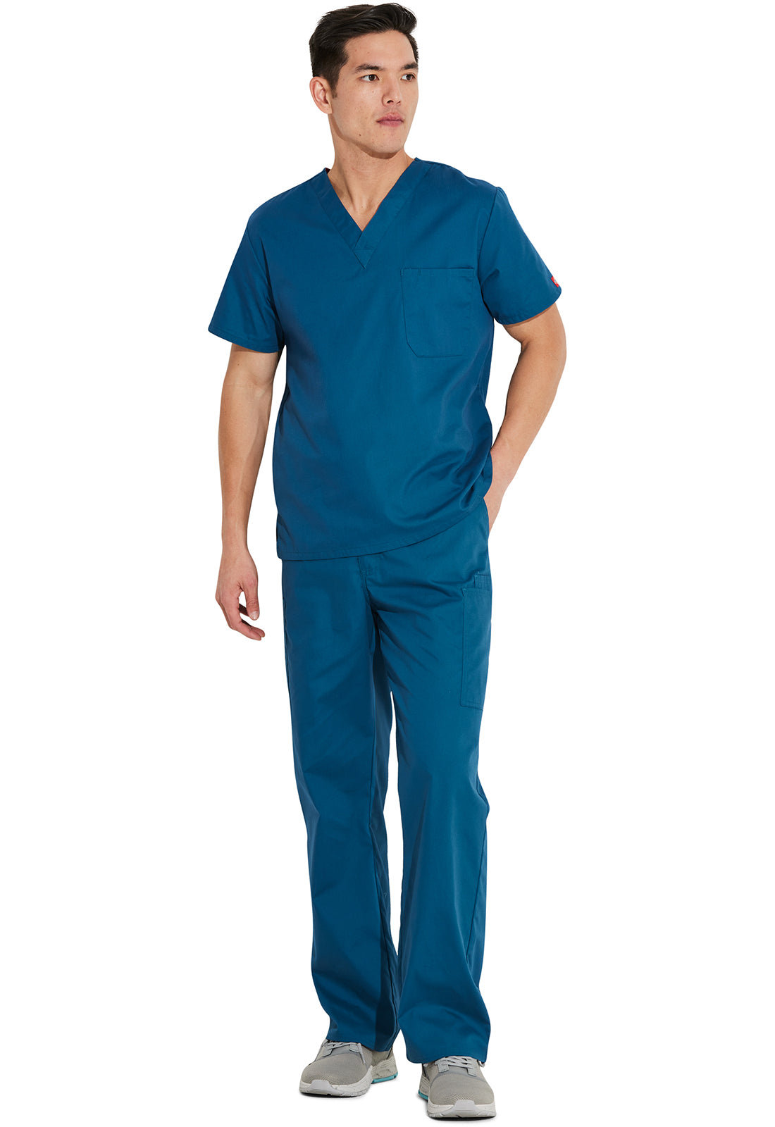 Unisex top met V-hals die in de broek gedragen kan worden met borstzak en zijsplitten