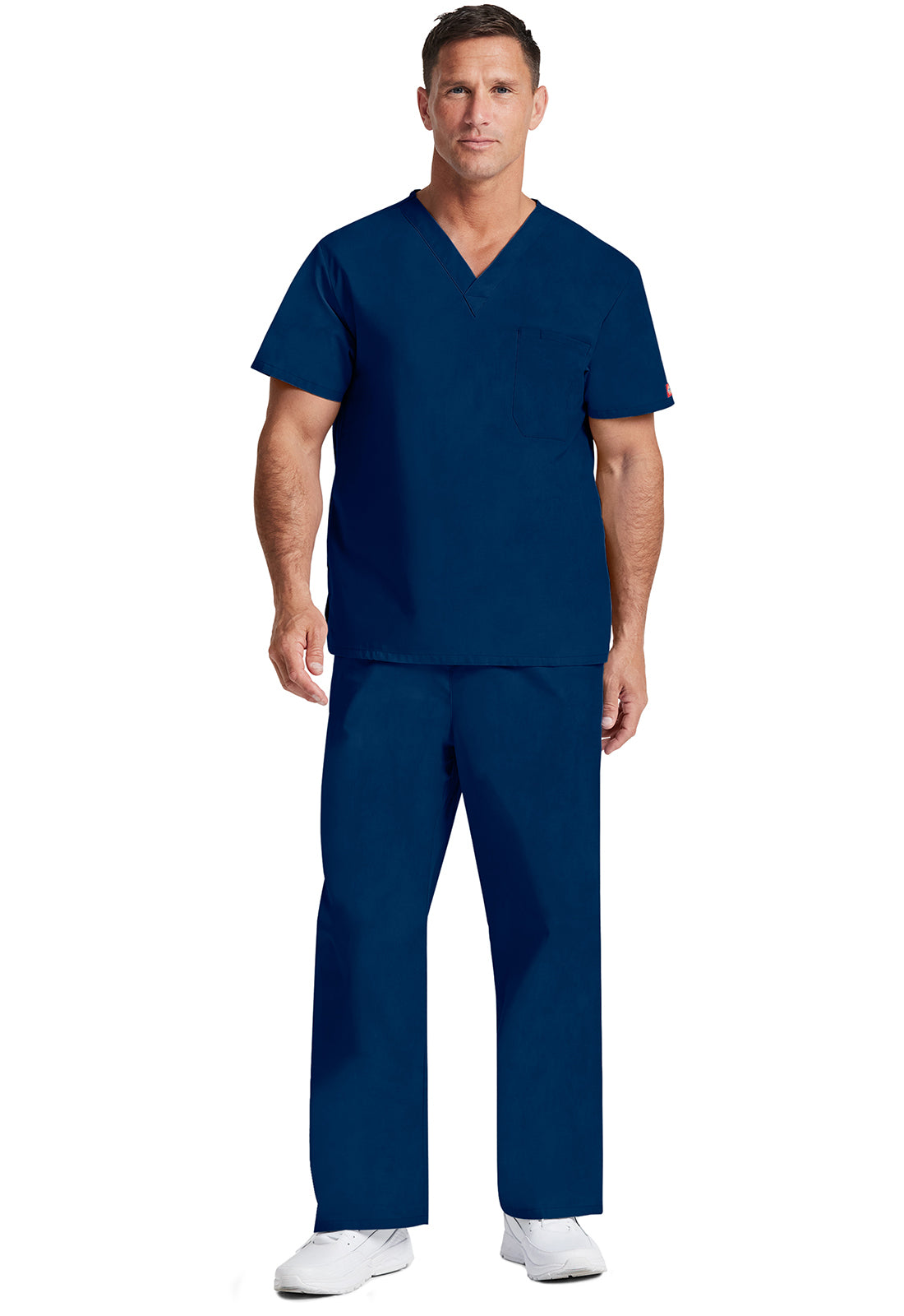 Unisex top met V-hals die in de broek gedragen kan worden met borstzak en zijsplitten