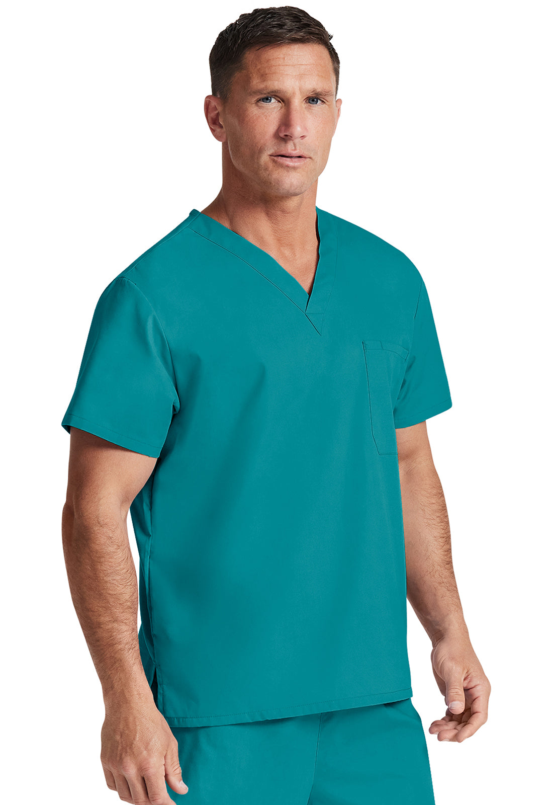 Unisex top met V-hals die in de broek gedragen kan worden met borstzak en zijsplitten