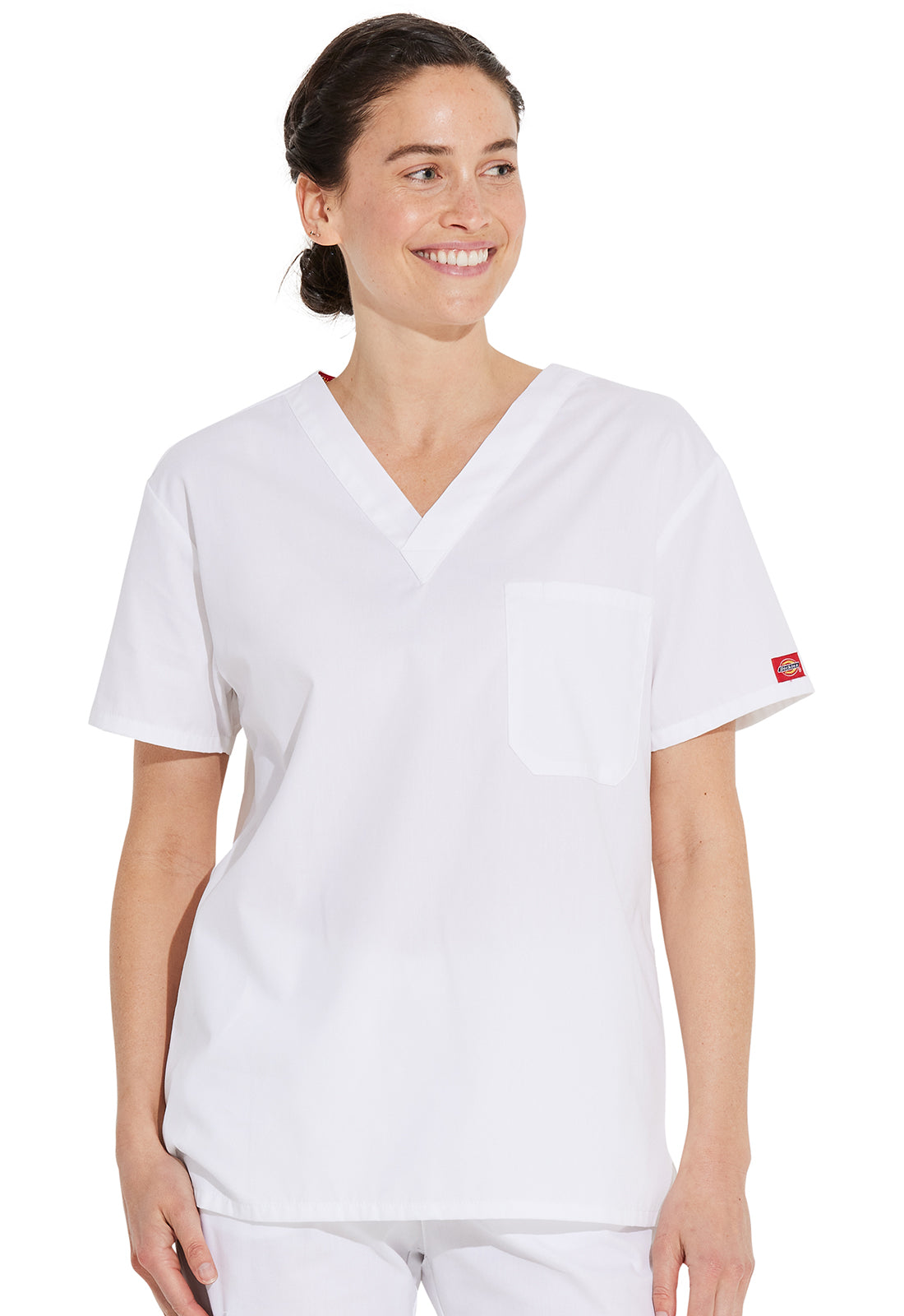 Unisex top met V-hals die in de broek gedragen kan worden met borstzak en zijsplitten