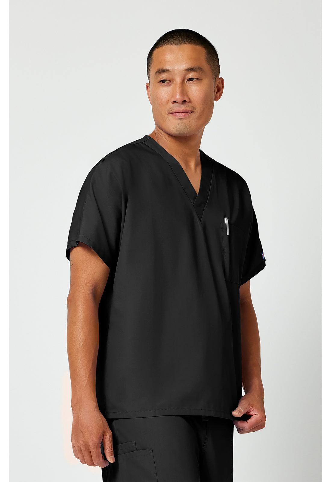 Unisex tuniek met V-hals met vleermuismouwen en borstzak WWE4777