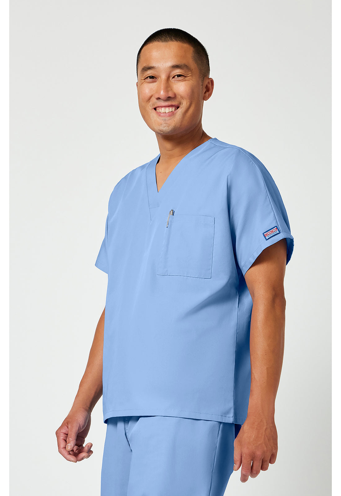 Unisex tuniek met V-hals met vleermuismouwen en borstzak WWE4777