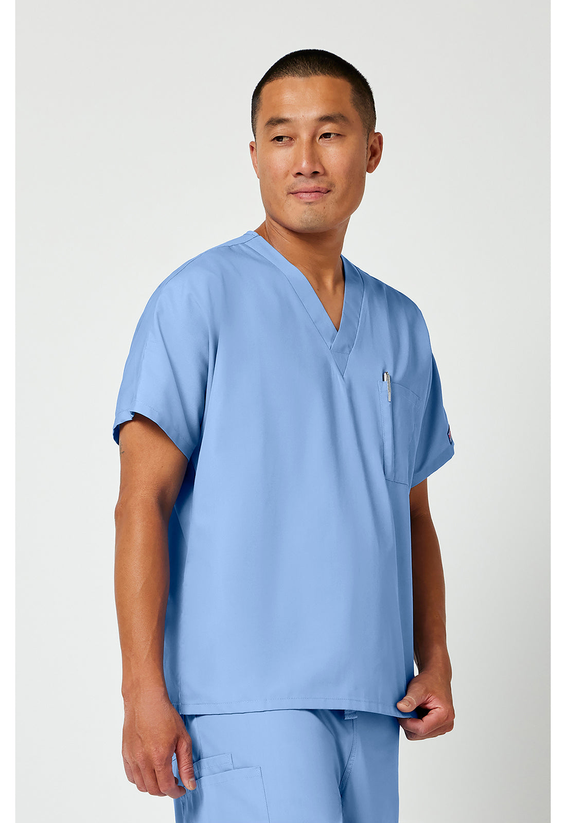 Unisex tuniek met V-hals met vleermuismouwen en borstzak WWE4777