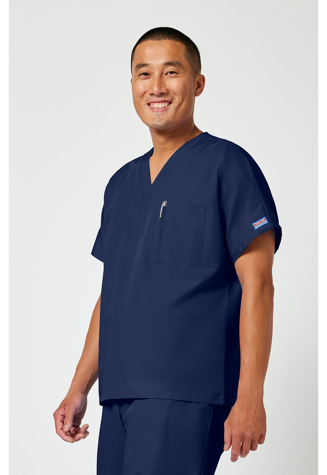 Unisex tuniek met V-hals met vleermuismouwen en borstzak WWE4777