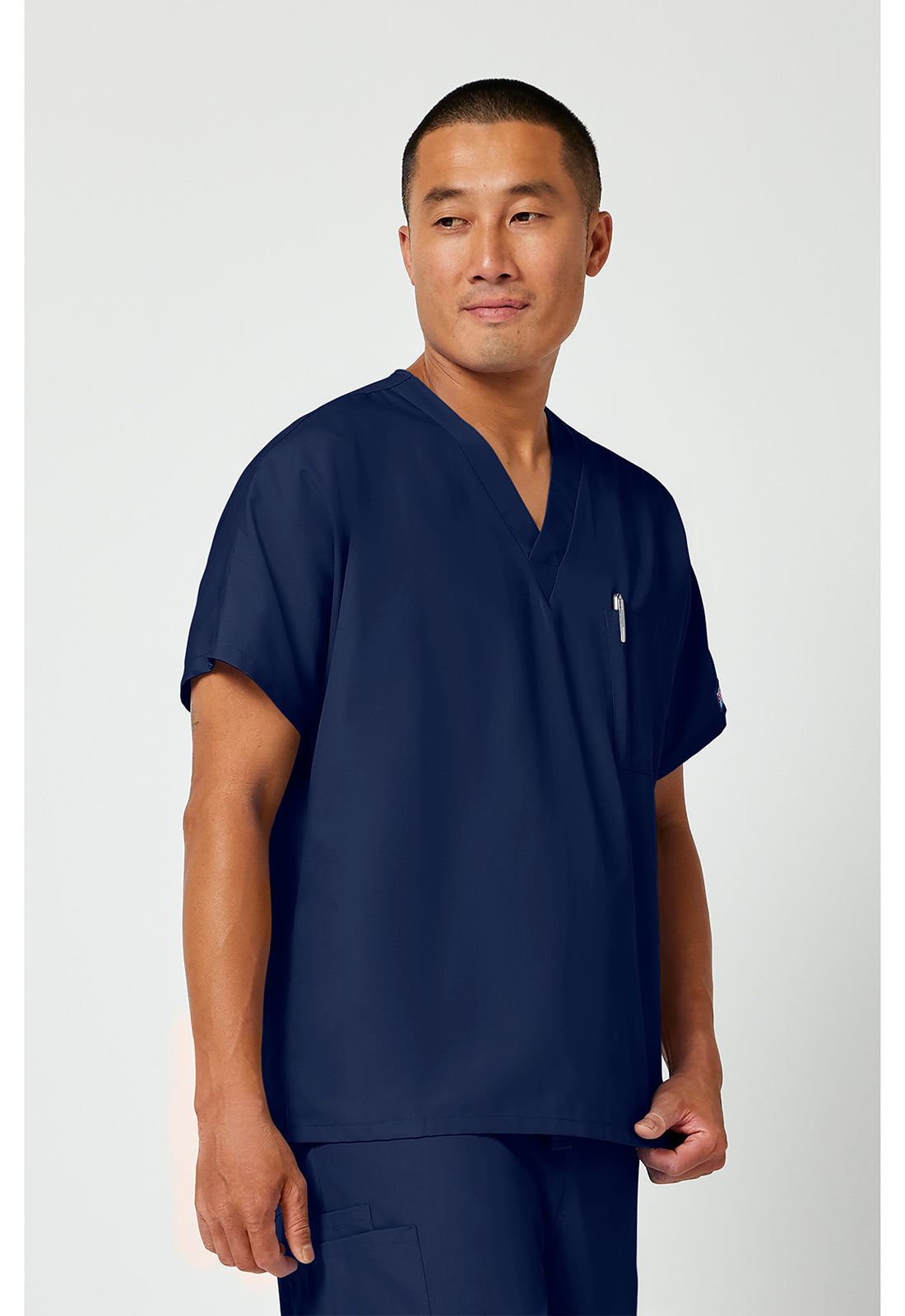 Unisex tuniek met V-hals met vleermuismouwen en borstzak WWE4777