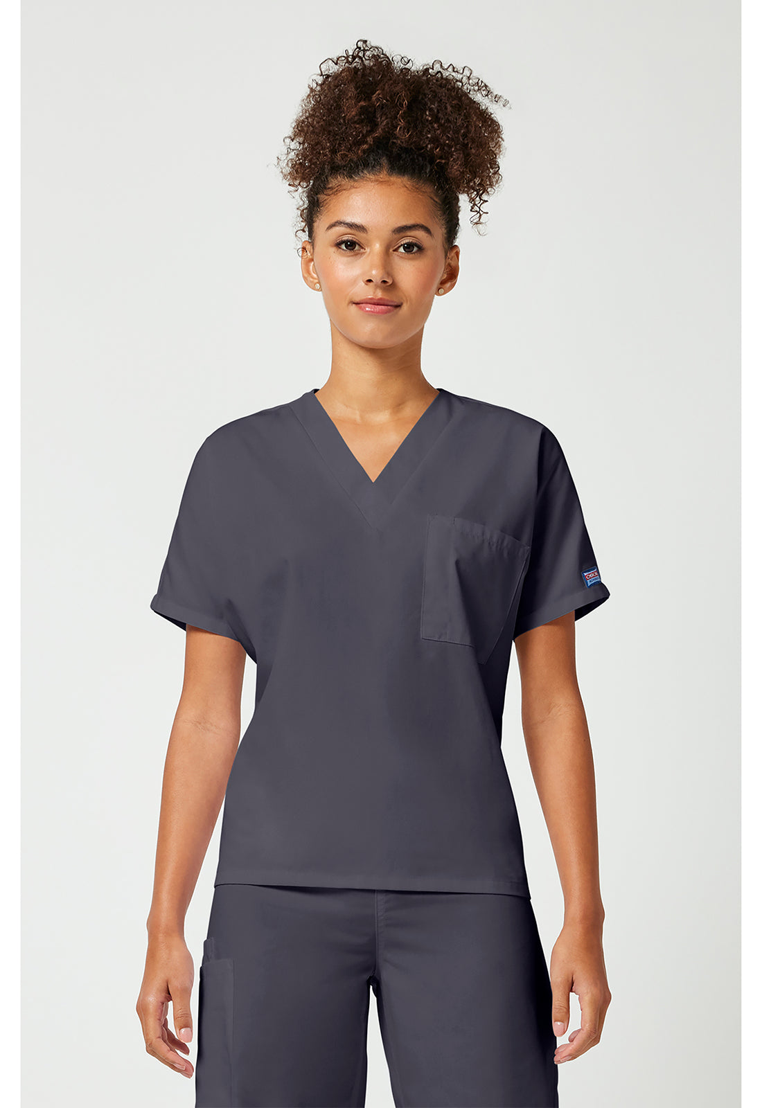 Unisex tuniek met V-hals met vleermuismouwen en borstzak WWE4777