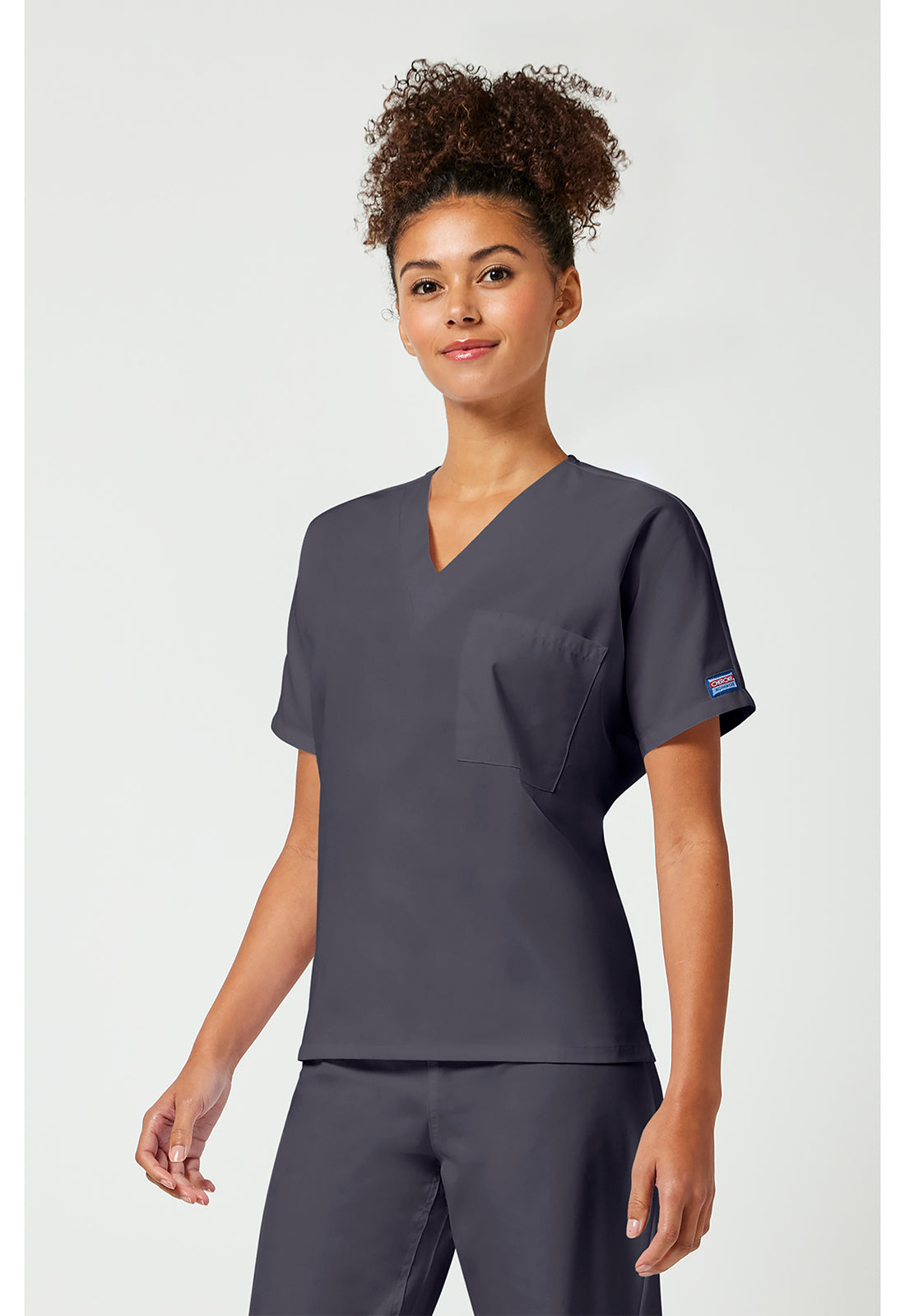 Unisex tuniek met V-hals met vleermuismouwen en borstzak WWE4777