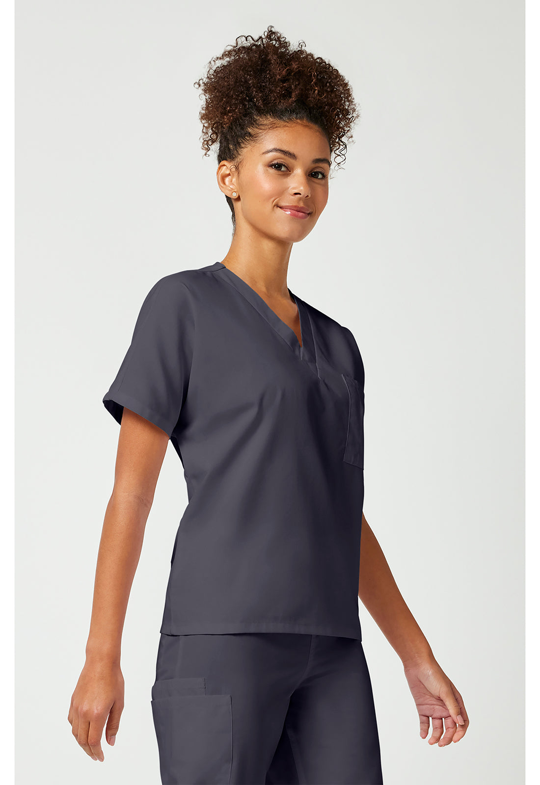 Unisex tuniek met V-hals met vleermuismouwen en borstzak WWE4777