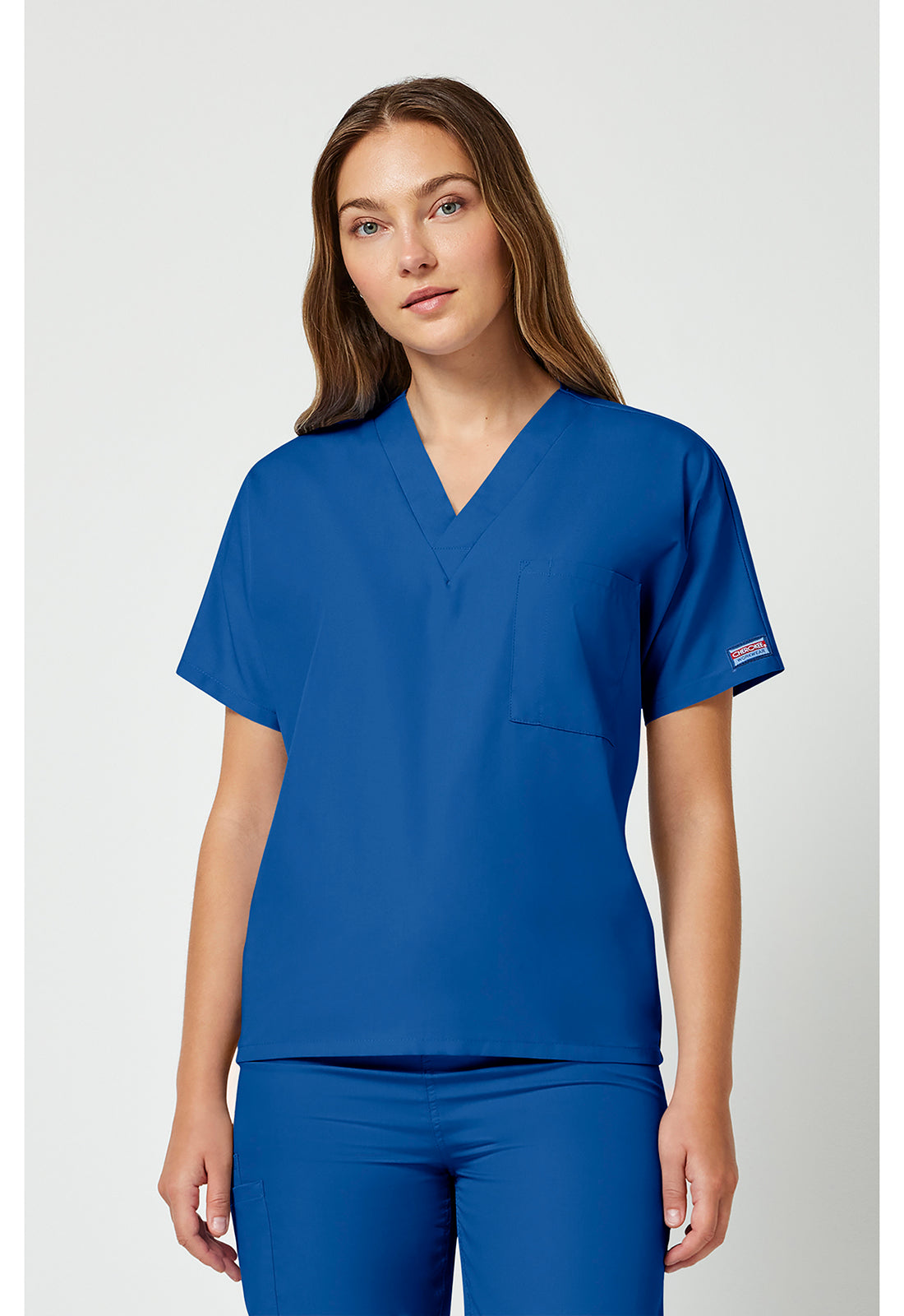 Unisex tuniek met V-hals met vleermuismouwen en borstzak WWE4777