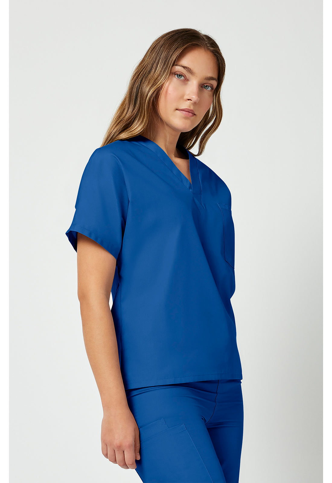 Unisex tuniek met V-hals met vleermuismouwen en borstzak WWE4777