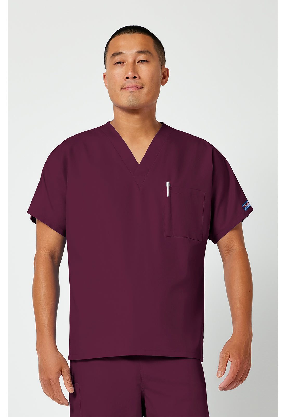 Unisex tuniek met V-hals met vleermuismouwen en borstzak WWE4777