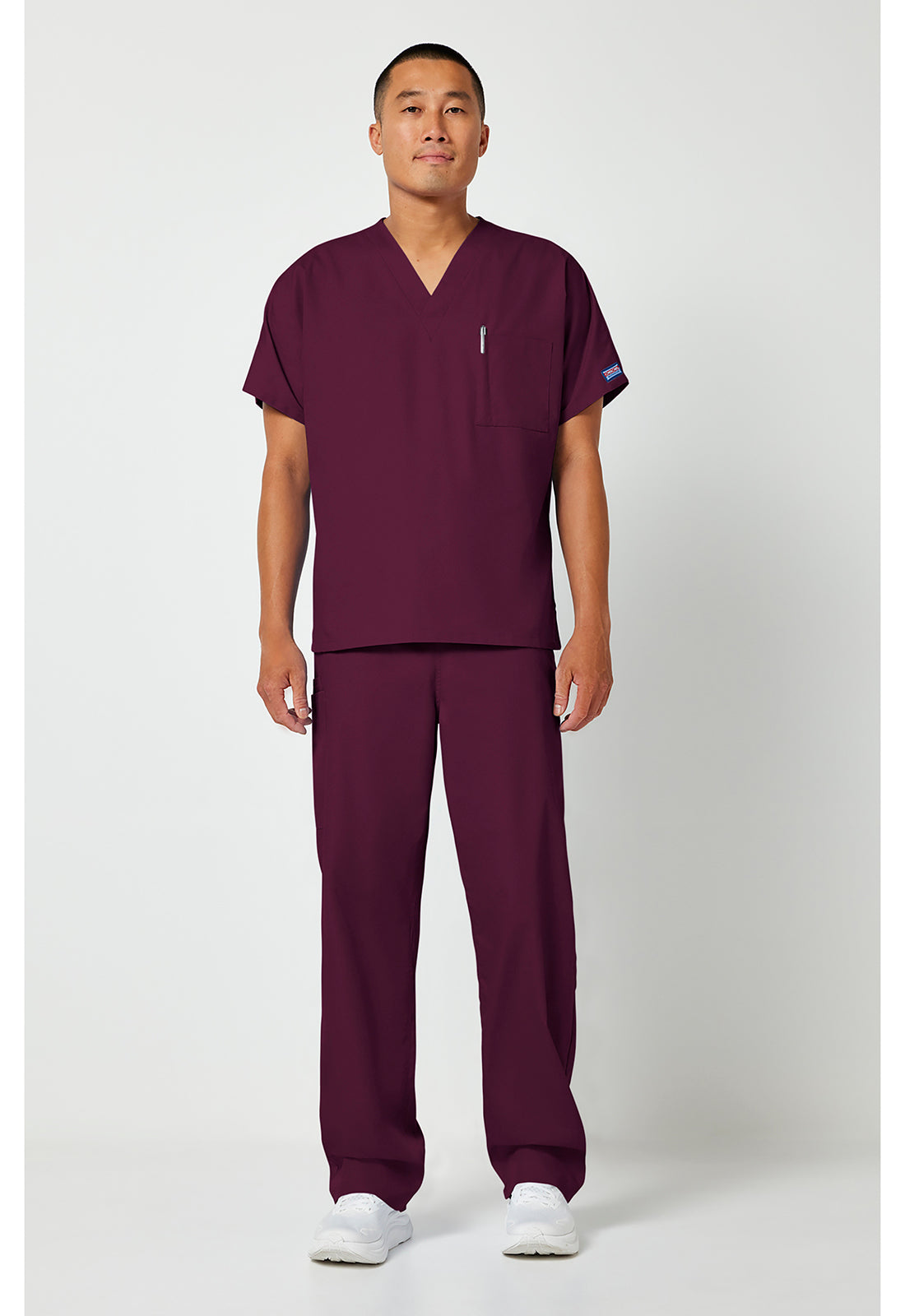 Unisex tuniek met V-hals met vleermuismouwen en borstzak WWE4777
