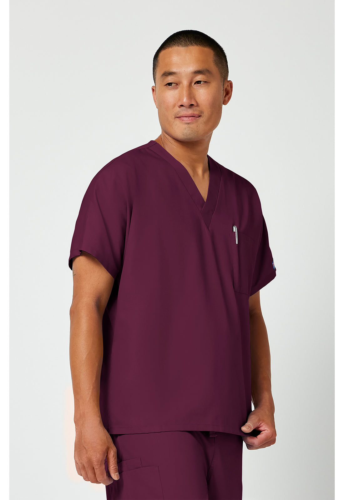 Unisex tuniek met V-hals met vleermuismouwen en borstzak WWE4777